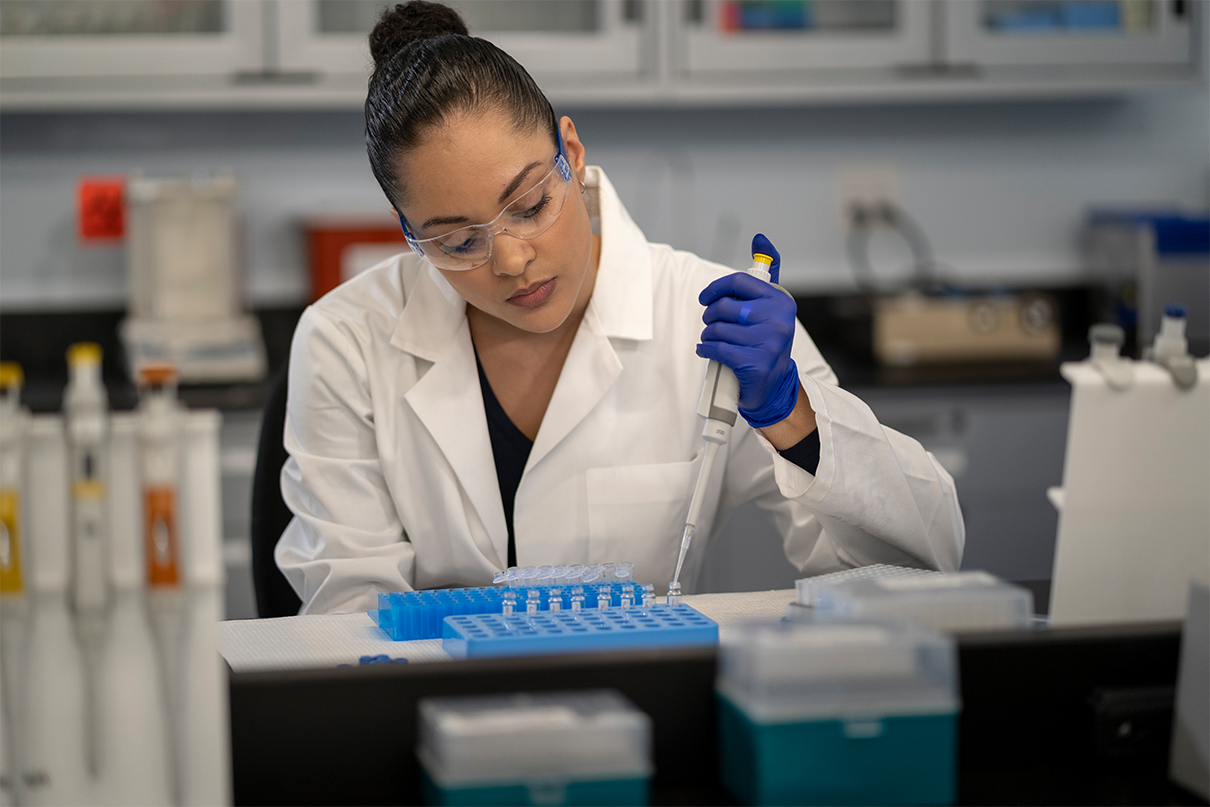 image depicting woman working in a lab